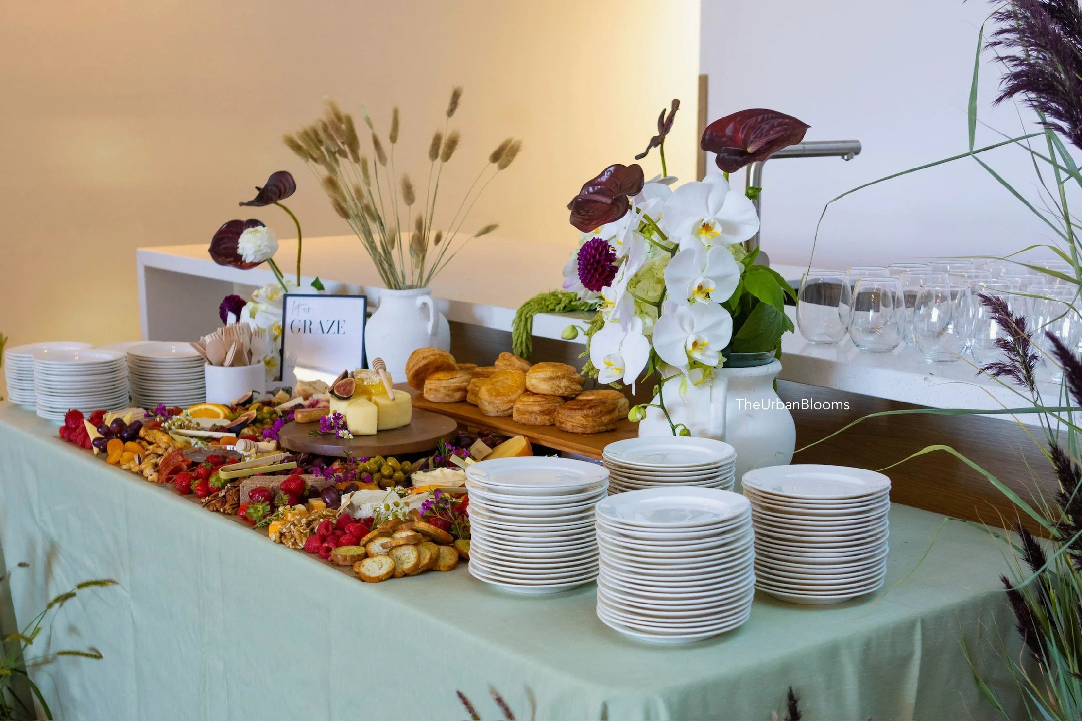Grazing table arrangements with wild grass feature