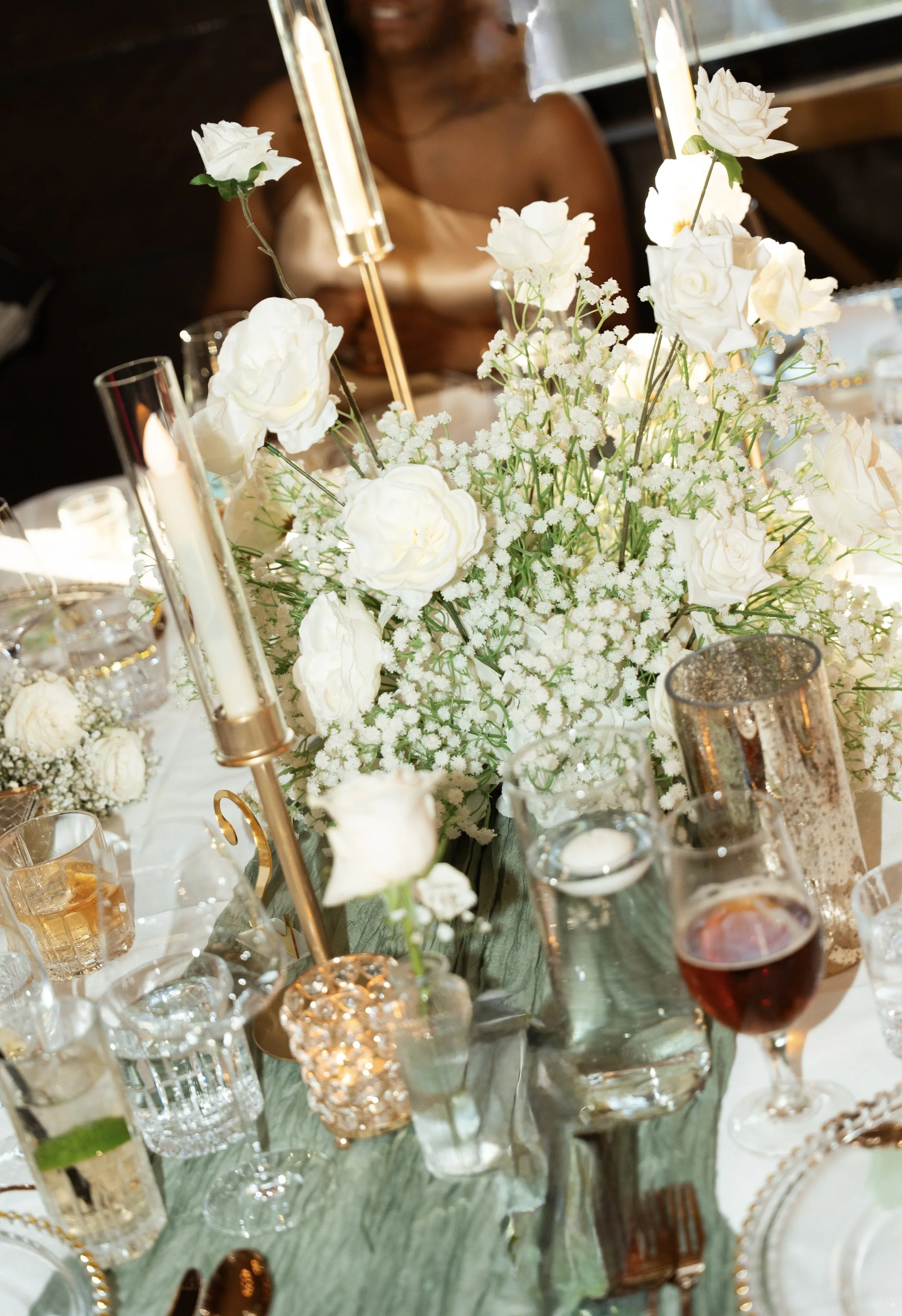 Faux baby's breath rental centrepieces