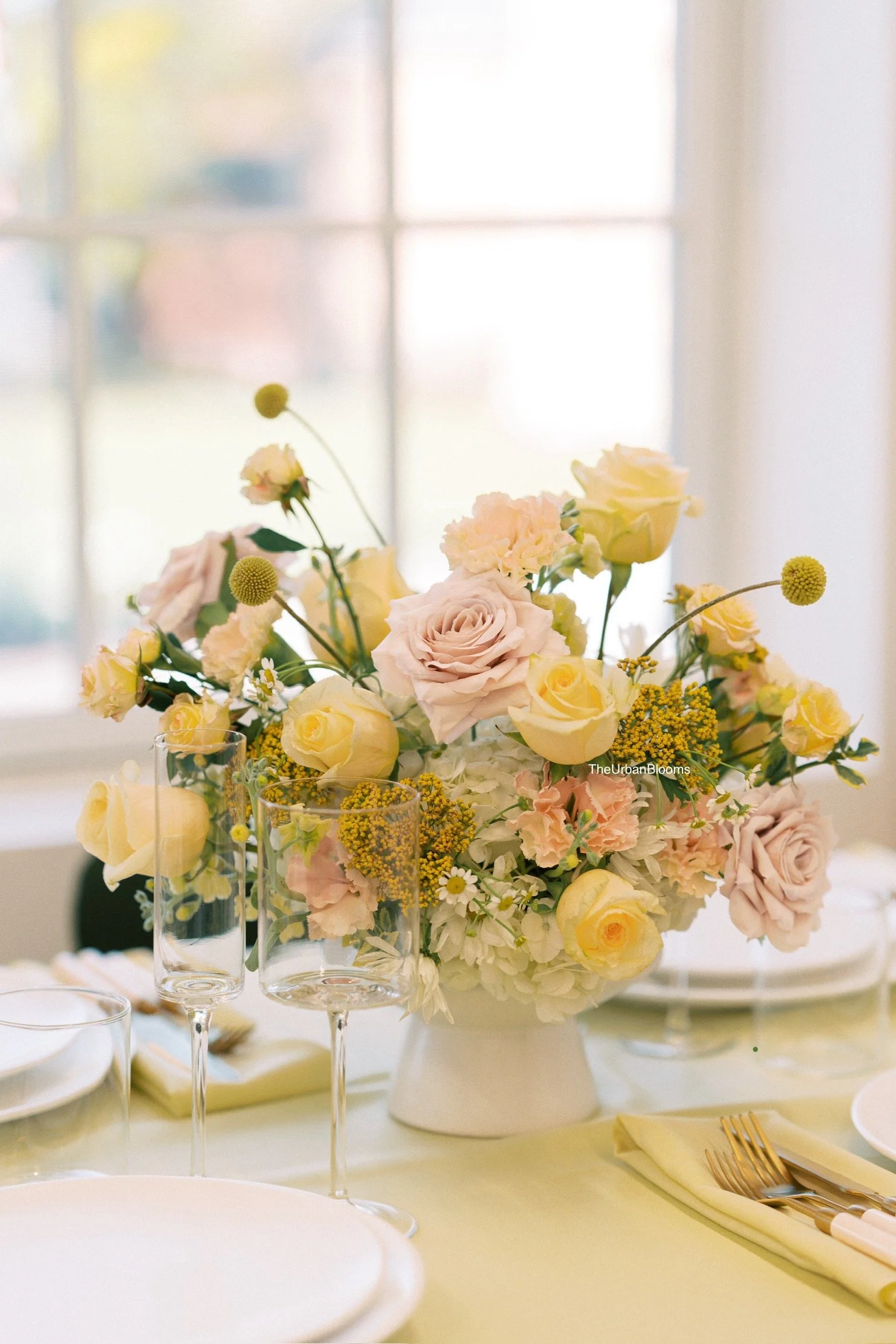 Grand Urban Blooms package with ceremony pillars and reception centrepieces